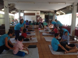 Massaging seniors at a community centre